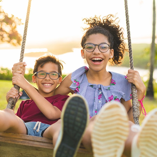 Kids smiling at Modern Orthodontics in Long Beach, CA